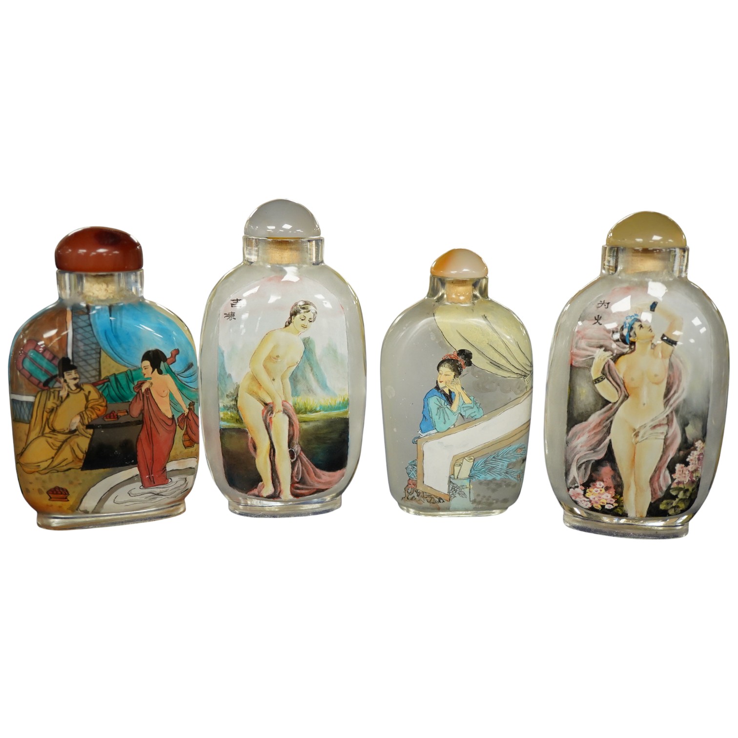 Four Chinese inside painted glass snuff bottles, tallest 9cm